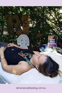 chakra balancing energy system for lady of massage table