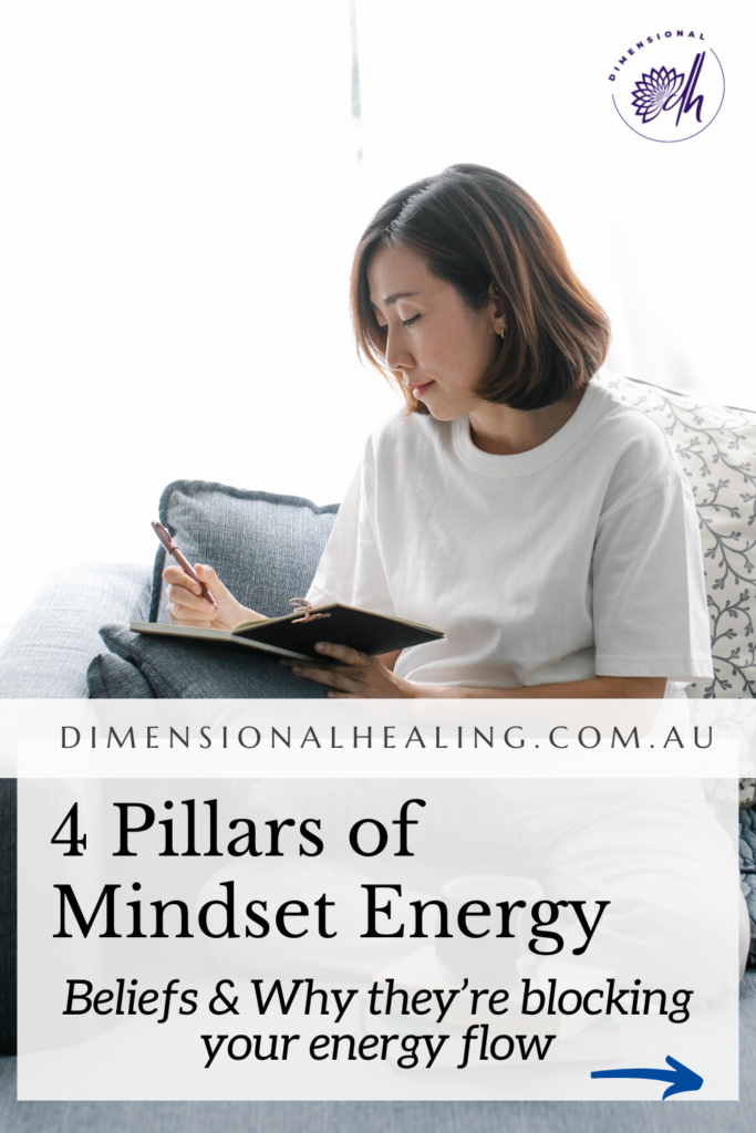 woman writing in her journal about Beliefs & Why they’re blocking your energy flow