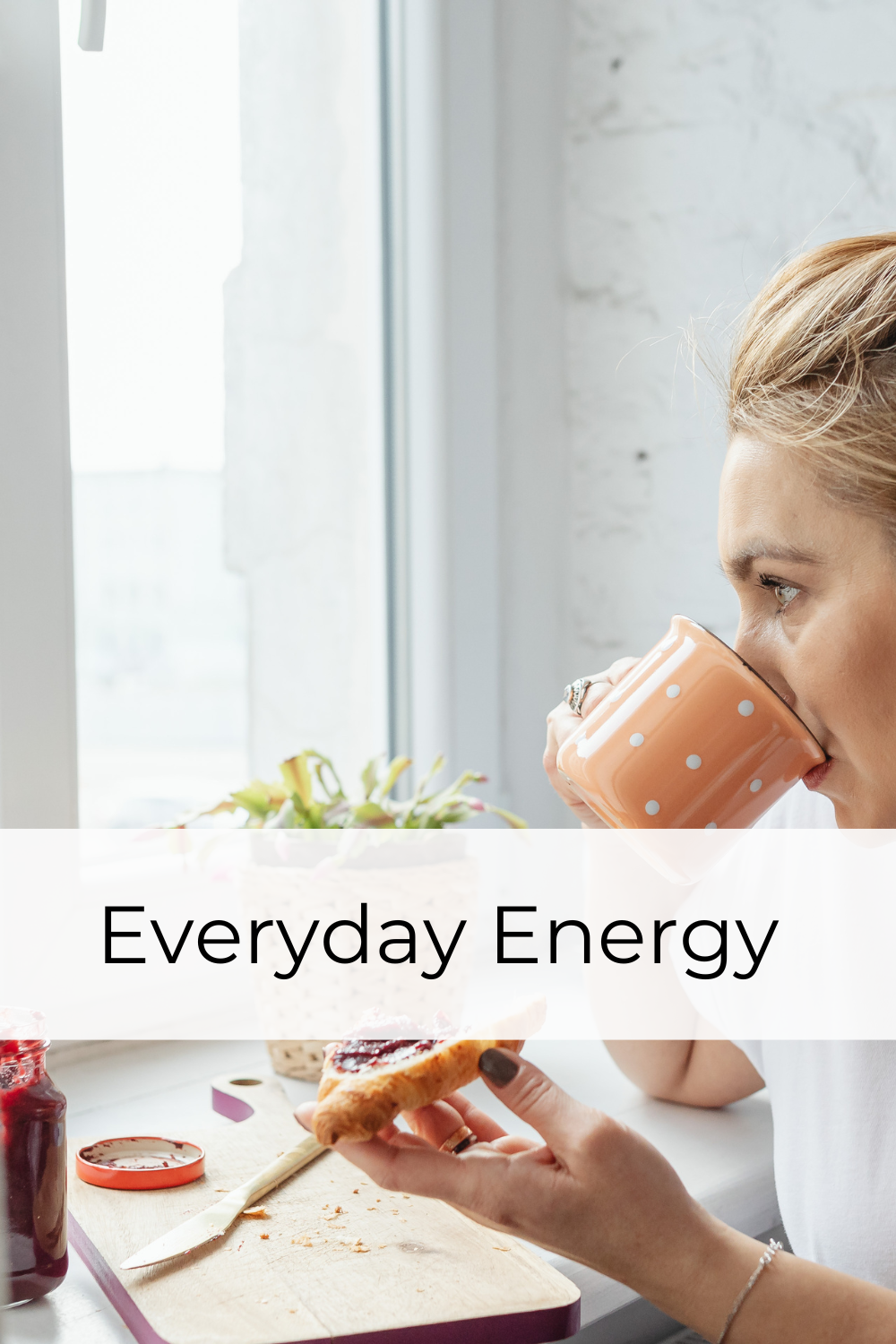 woman starting her day with tea and toast by the window
