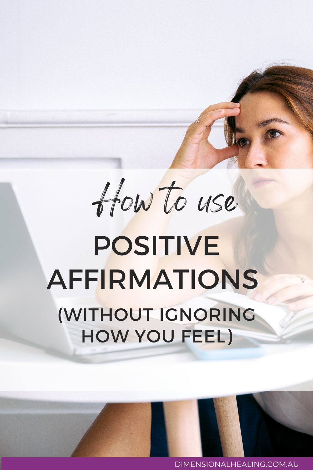 woman sitting with her laptop and book to focus on positive affirmatiions to feel better