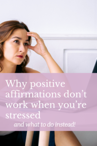 woman sitting at her laptop feeling stressed and trying to feel better using positive affirmations